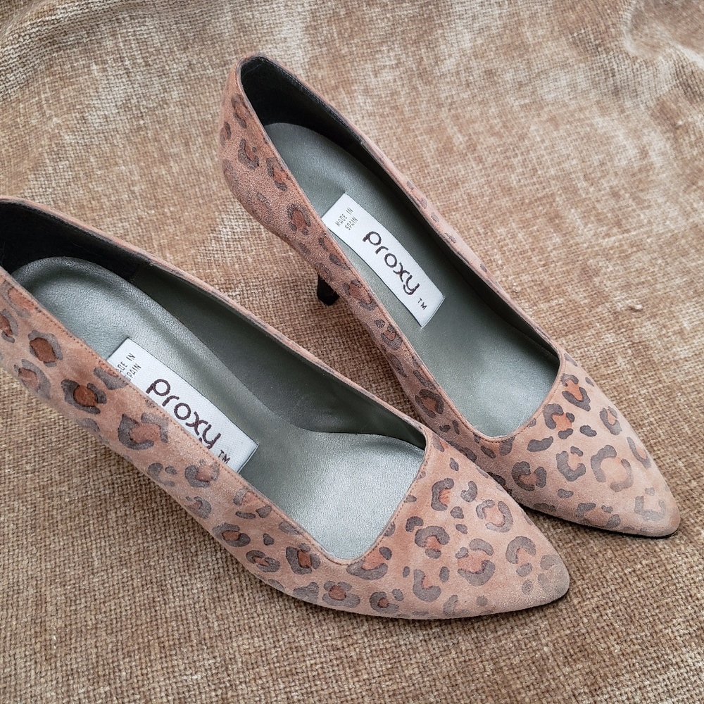 Designer size six leopard print suede heels